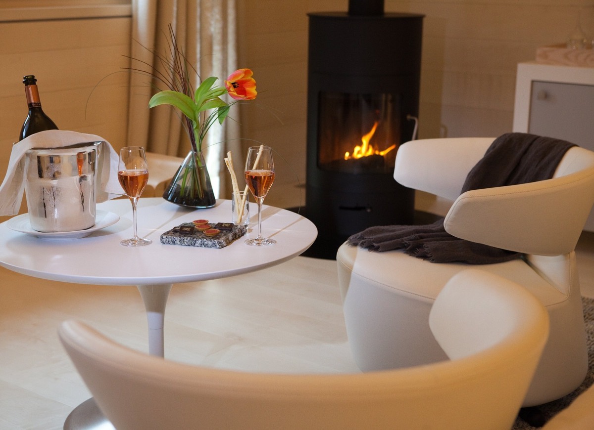 Fireside lounge with a bottle on ice